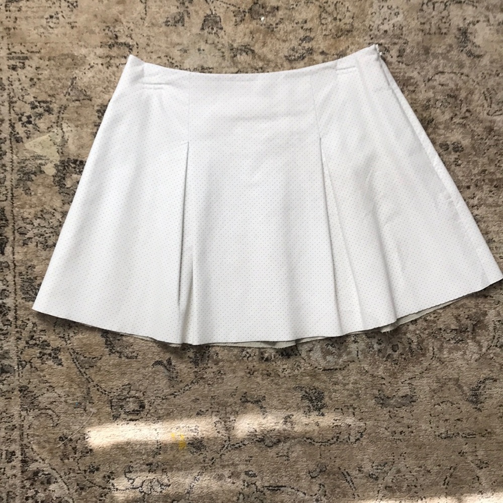 White pleated skirt